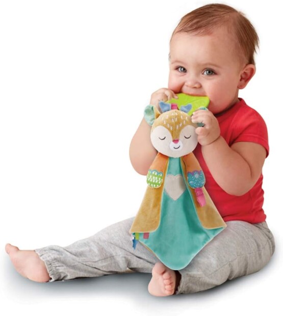 Bébé mâchouille l'anneau de dentition de Tifan