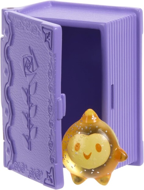 Livre violet miniature ouvert avec Star l'étoile magique