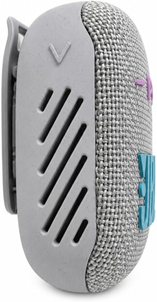Profil de l’enceinte avec ses six fentes acoustiques inclinées et sa face avant en tissu gris