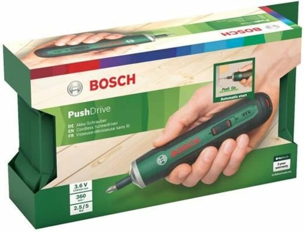 Emballage de la visseuse PushDrive illustré de bois sur fond boisé