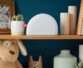 Veilleuse coucher de soleil Fisher-Price sur une étagère